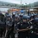 Police in riot gear block a street during a march in honor of Freddie Gray on April 25, 2015, in Baltimore.
Alex Wong/Getty Images